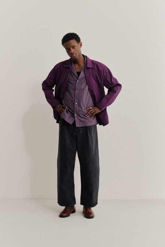 Men's long-sleeved shirt, recycled polyamide, garment-dyed purple, with two-way zipper and patch pocket.
