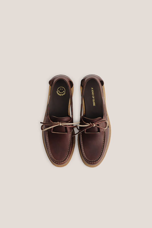 Men's accessories, Barolo Boat Sandal, premium Italian vegetal cowhide, dark brown, with white stitching and leather laces.