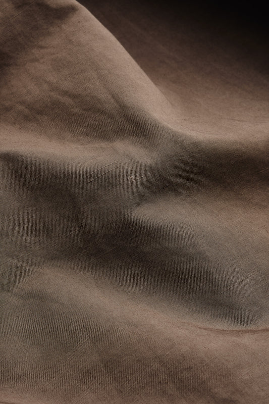 Men's long-sleeved shirt jacket, cotton-linen blend, garment dyed brown, with natural structure.
