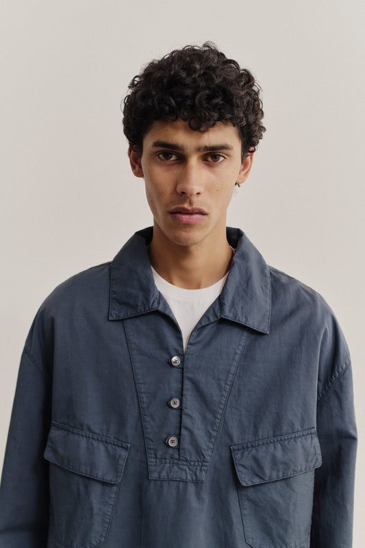 Men's long-sleeved shirt jacket, cotton-linen blend, garment dyed navy, with spread collar and patch pockets.