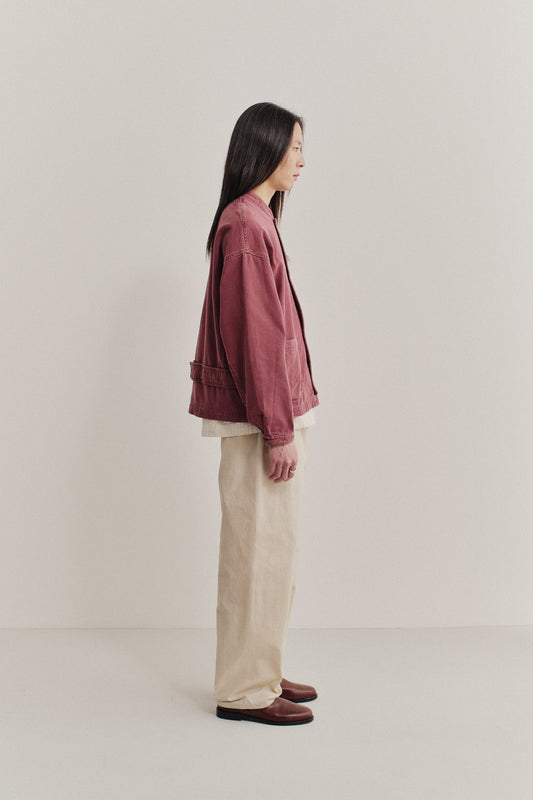 Men's outerwear jacket, organic cotton, stone washed, faded red, boxy fit, stand-up collar, patch pockets.