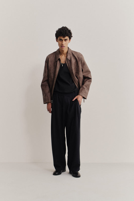 Men's outerwear, cropped nubuck leather jacket, vintage brown, with pleated back and zippered sleeves.