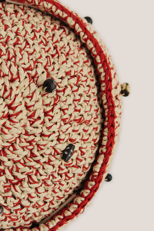 Women's accessories crochet cap, viscose-linen-cotton blend, natural raffia look, red and cream, adorned with mussels and wooden beads.