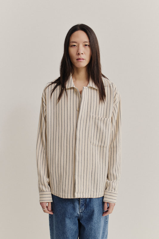 Men's long-sleeved shirt, cotton and recycled cotton blend, off-white with navy stripes, boxy fit, patch pocket.