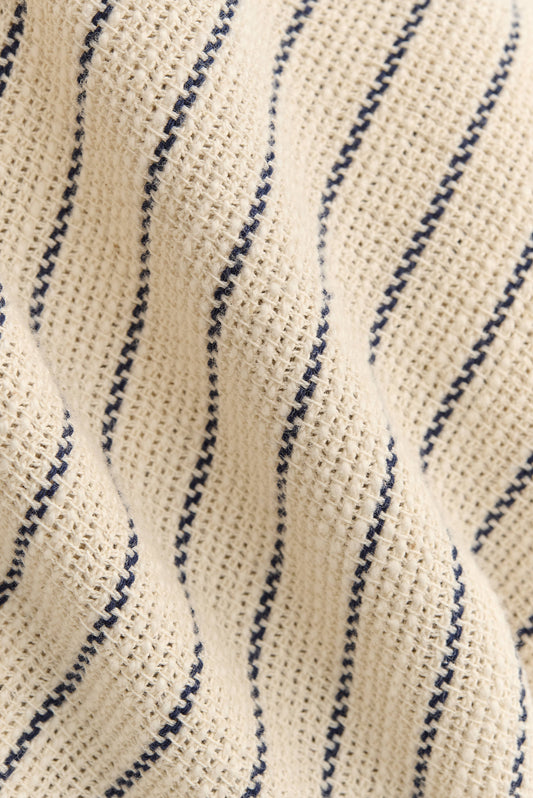 Men's short-sleeved shirt, cotton and recycled cotton blend, off-white with navy engineered stripes.