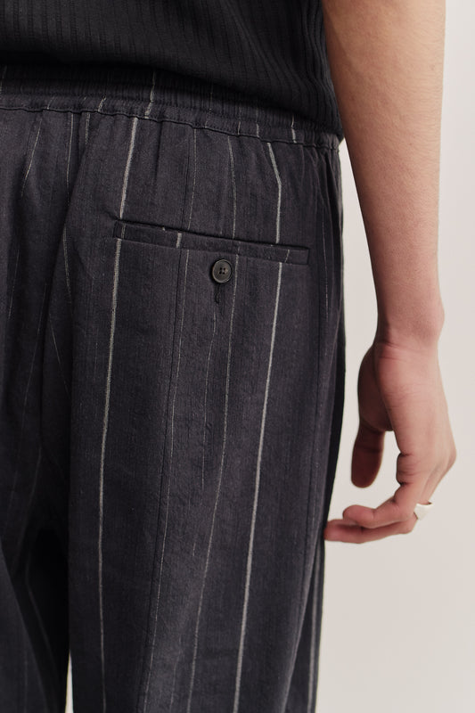 Men's long pants, cotton linen blend, lightly textured, black with white stripes, elastic waist, welt pocket.