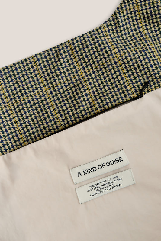 Women's accessories bag, cotton houndstooth in navy, green, and yellow on beige, with "A KIND OF GUISE" label.