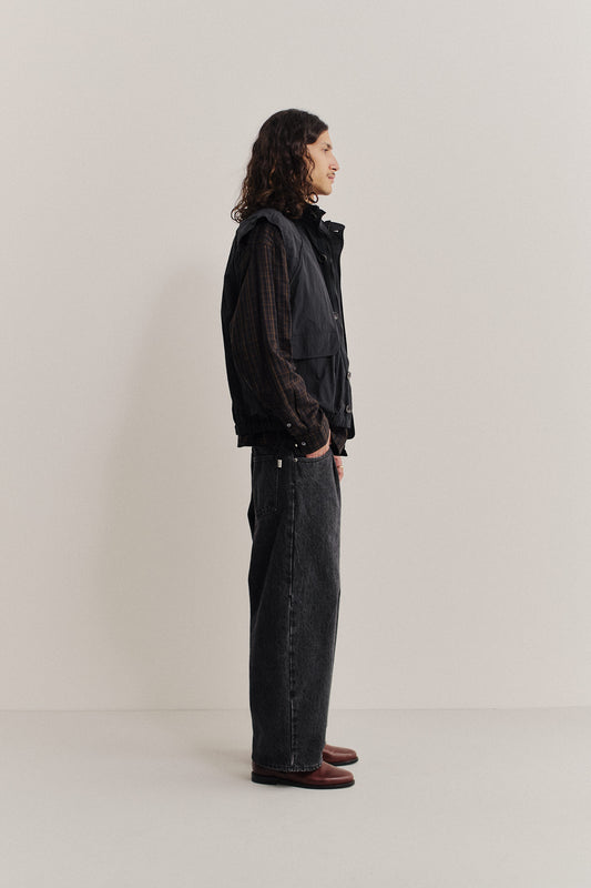 Men's outerwear, Zambezi Fisher Jacket in black recycled nylon and cotton blend, with wide silhouette and bellows pockets.