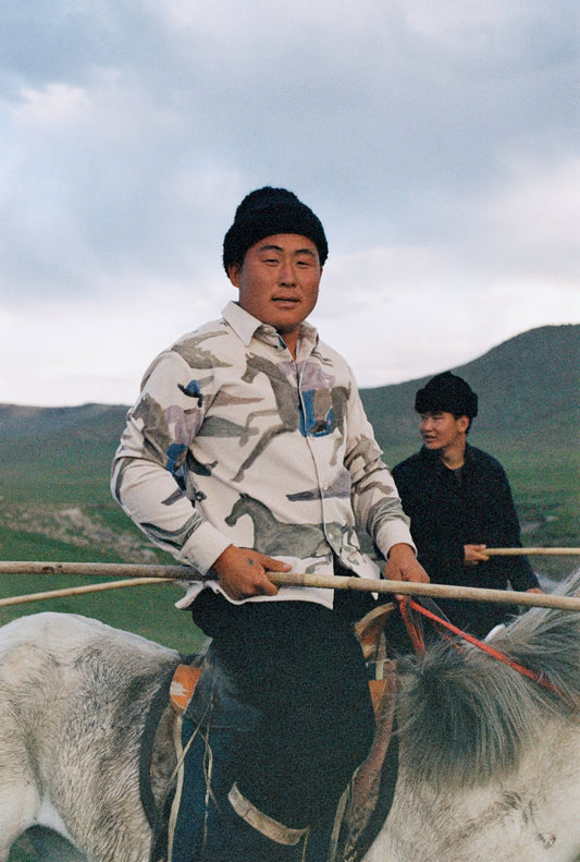 A HORSE RIDER IN MOTION