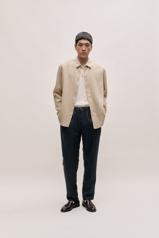 ELASTICATED WIDE TROUSERS