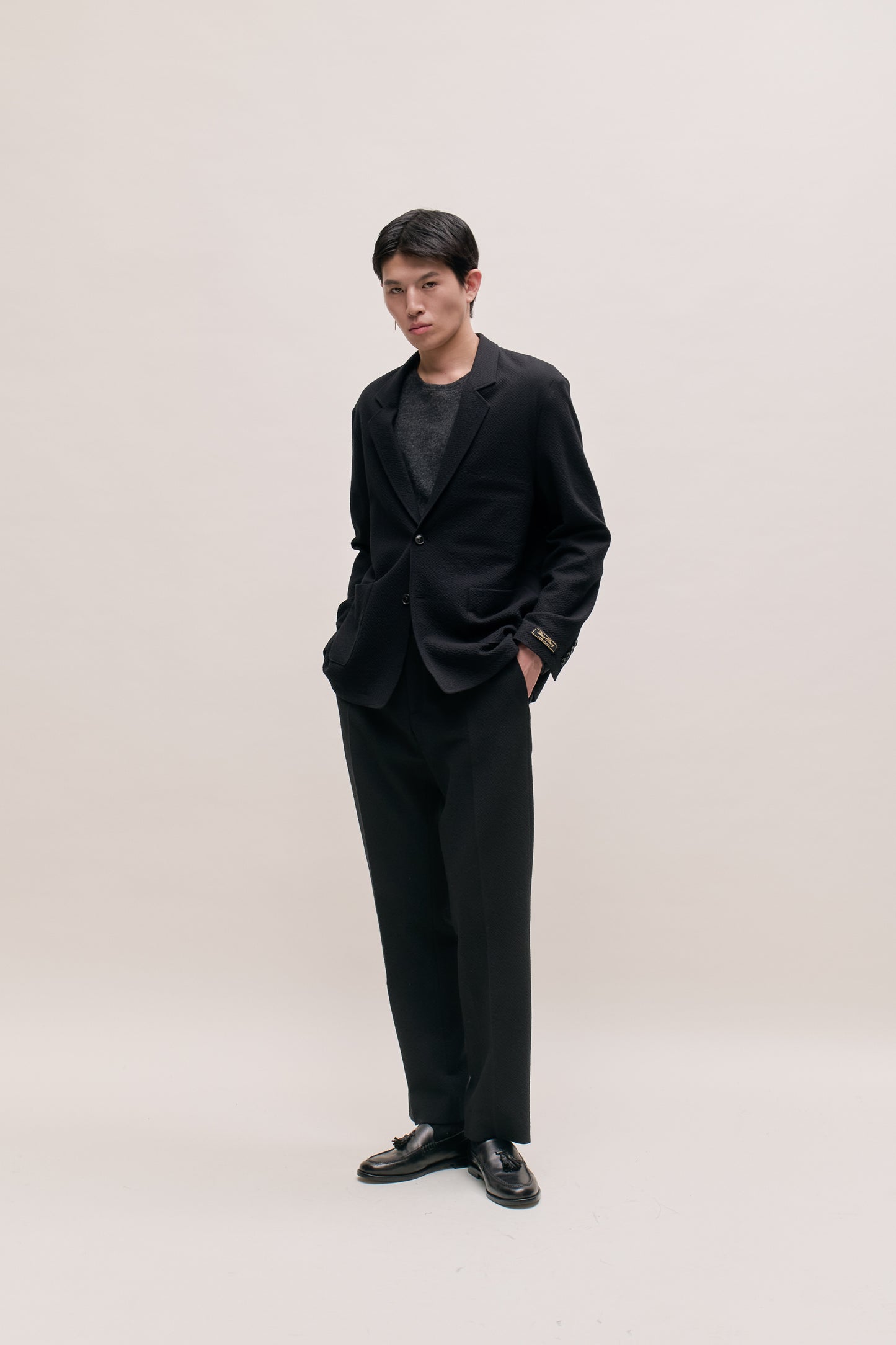 RELAXED TAILORED TROUSERS