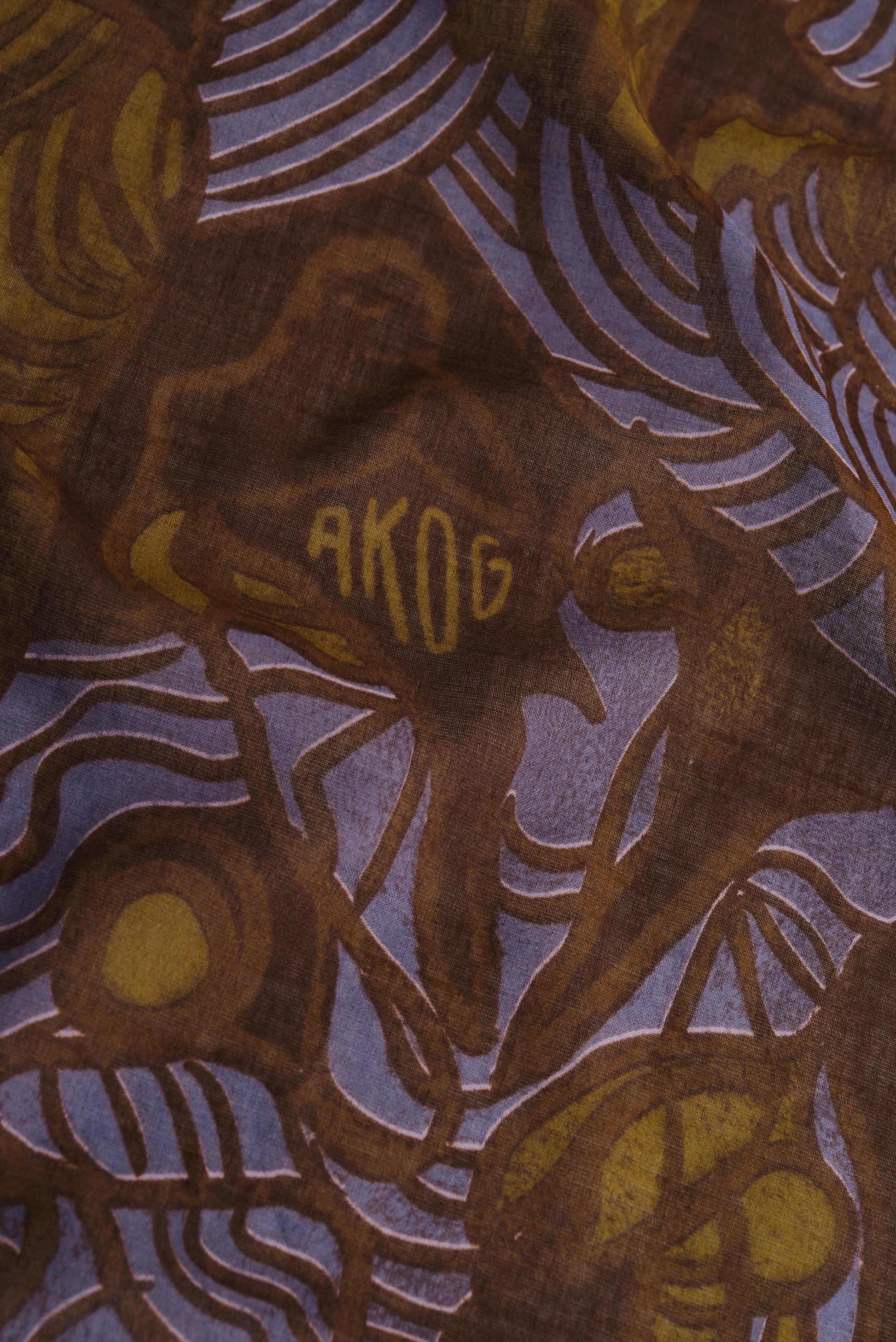 Women's accessories bandana, cotton, brown with blue and yellow African wildlife print.