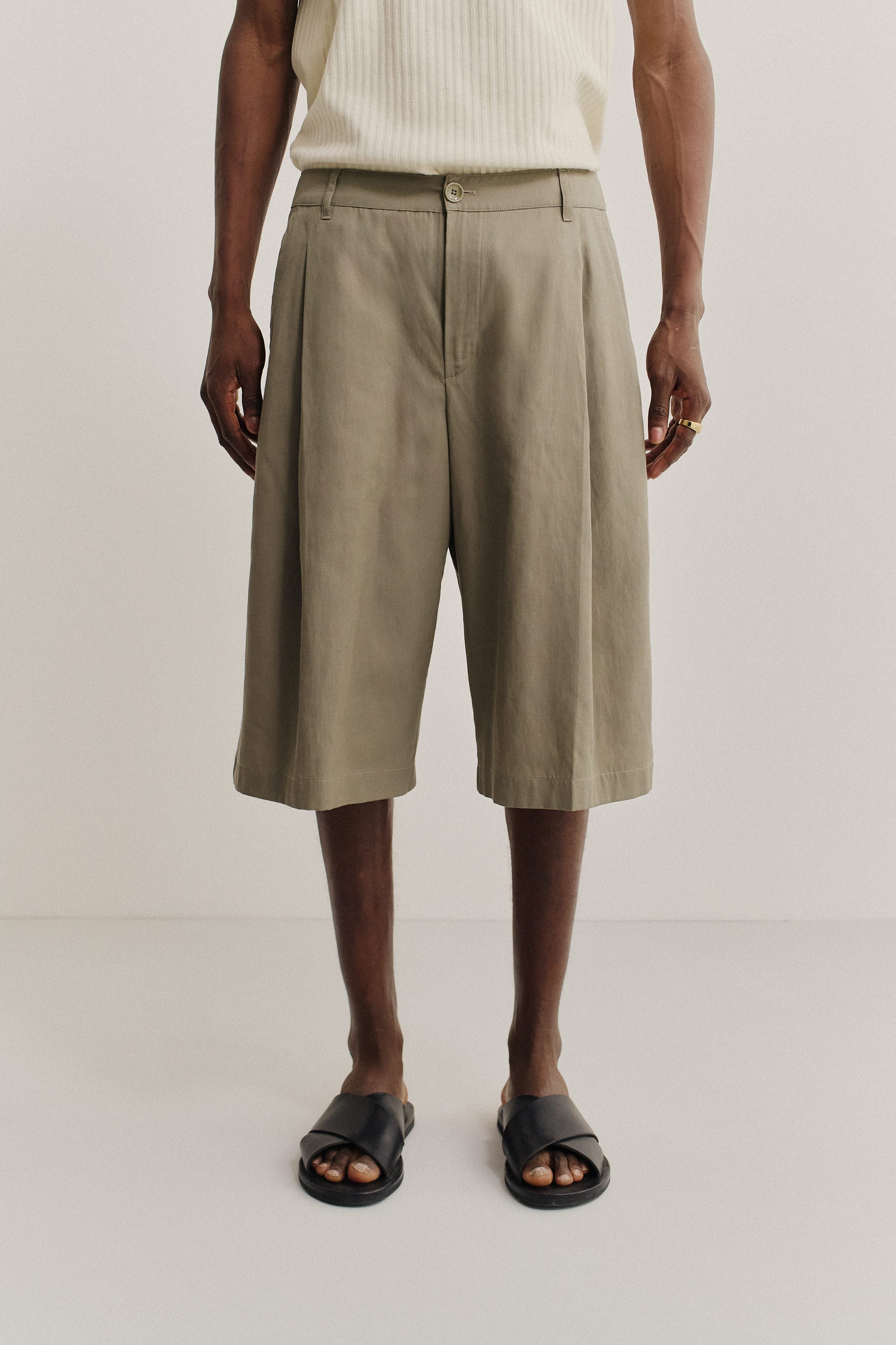 Men's shorts, lyocell-cotton-linen twill, sun-bleached sage, knee-length, relaxed fit, wide leg, single pleat.