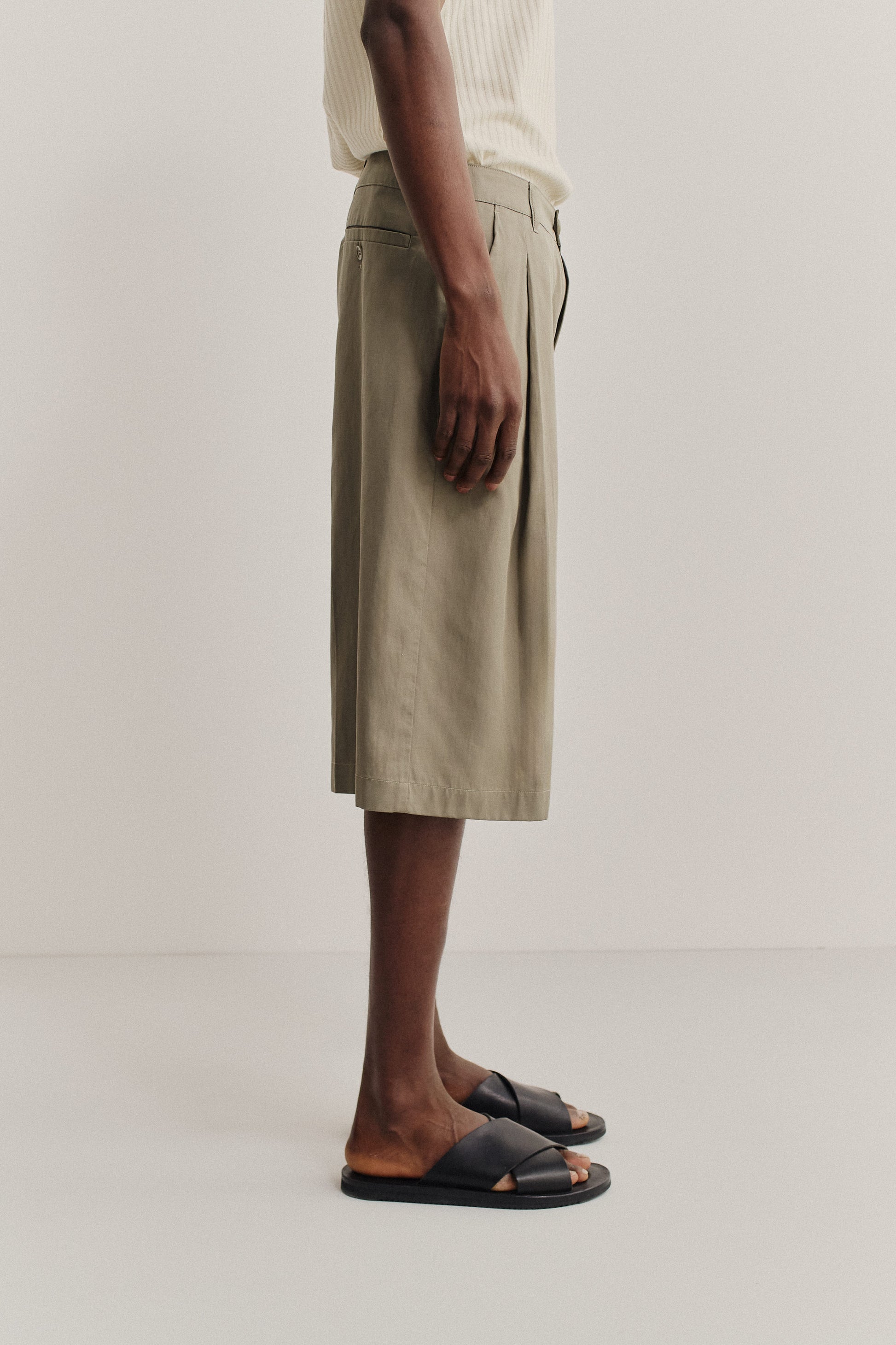Men's shorts, lyocell-cotton-linen twill, sun-bleached sage, relaxed fit, wide leg, single pleat.