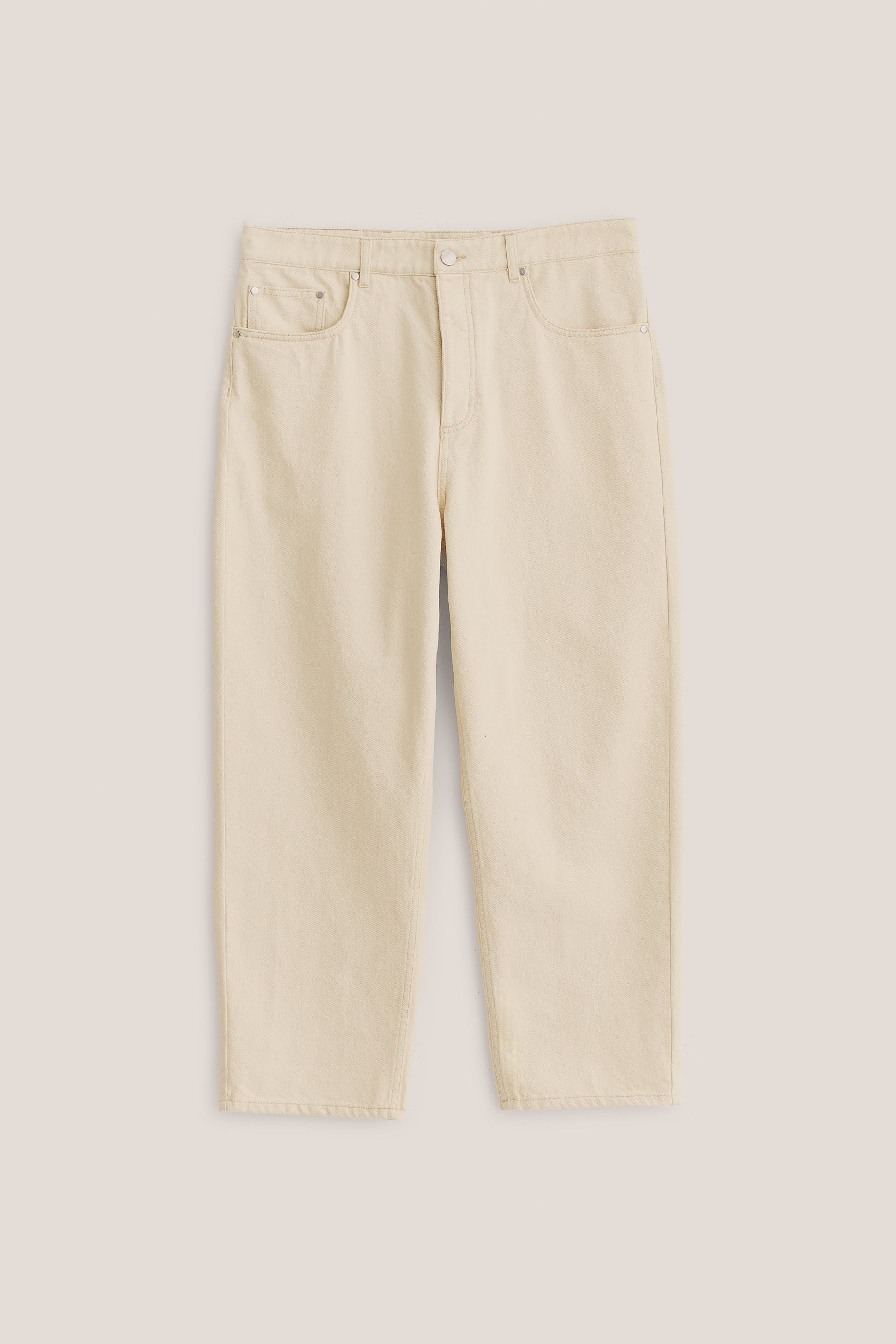 Men's long pants, organic cotton raw denim, pre-washed, off-white, loose fit, tapered leg, cropped length.