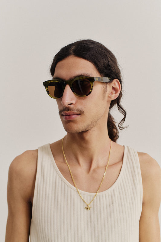 Men's accessories sunglasses, acetate, olive green, round-shaped curvy frame with keyhole, thick square temples.