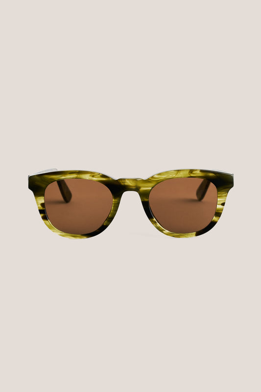 Unisex accessories sunglasses, round-shaped acetate frame in green tortoise with brown Carl Zeiss lenses.