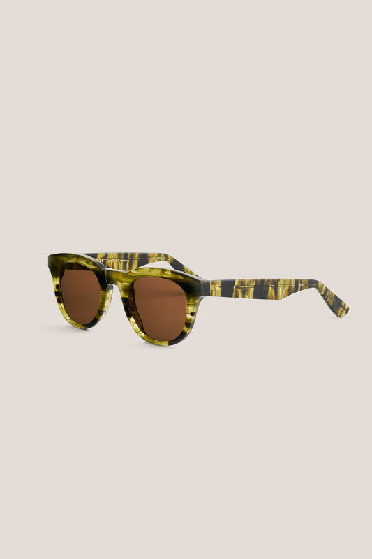 Unisex accessories sunglasses, round-shaped curvy acetate frame with keyhole, green and black marbled pattern, brown lenses.