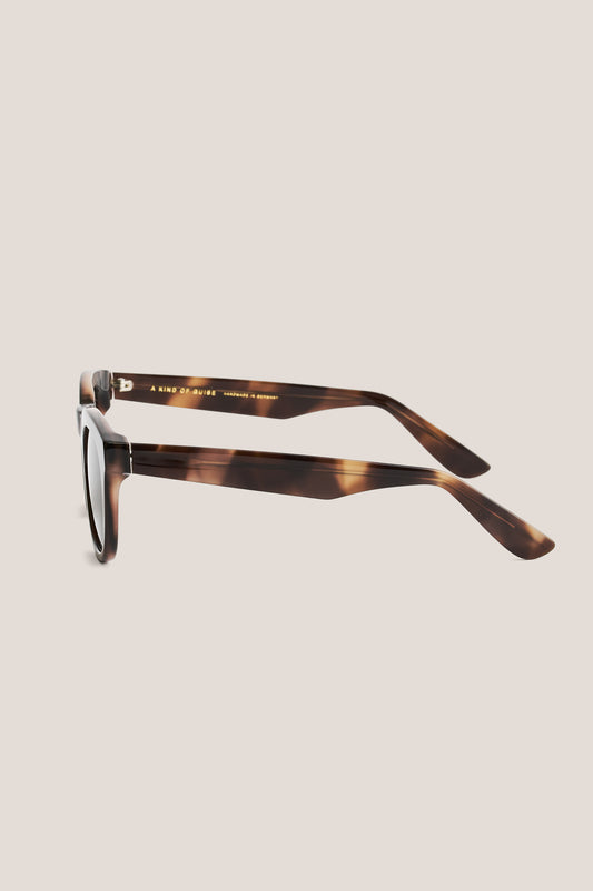 Unisex accessories sunglasses, handmade Italian acetate, tortoiseshell brown, round-shaped frame, keyhole bridge, thick square temples.