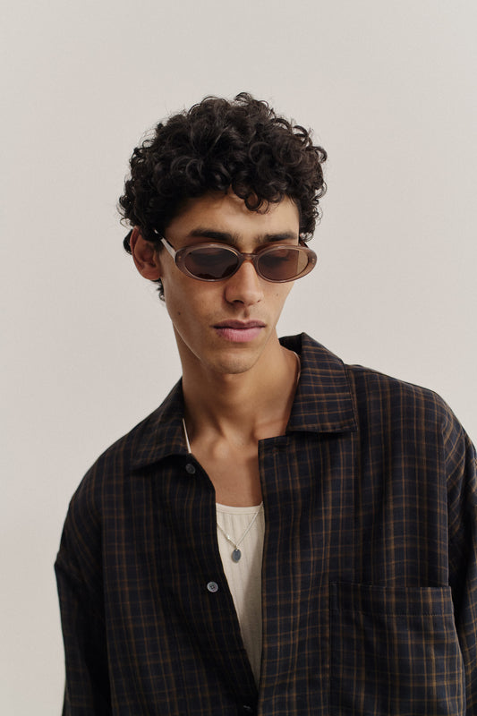 Unisex accessories sunglasses, handcrafted oval acetate-frame in solid black with dark grey Carl Zeiss® lenses.