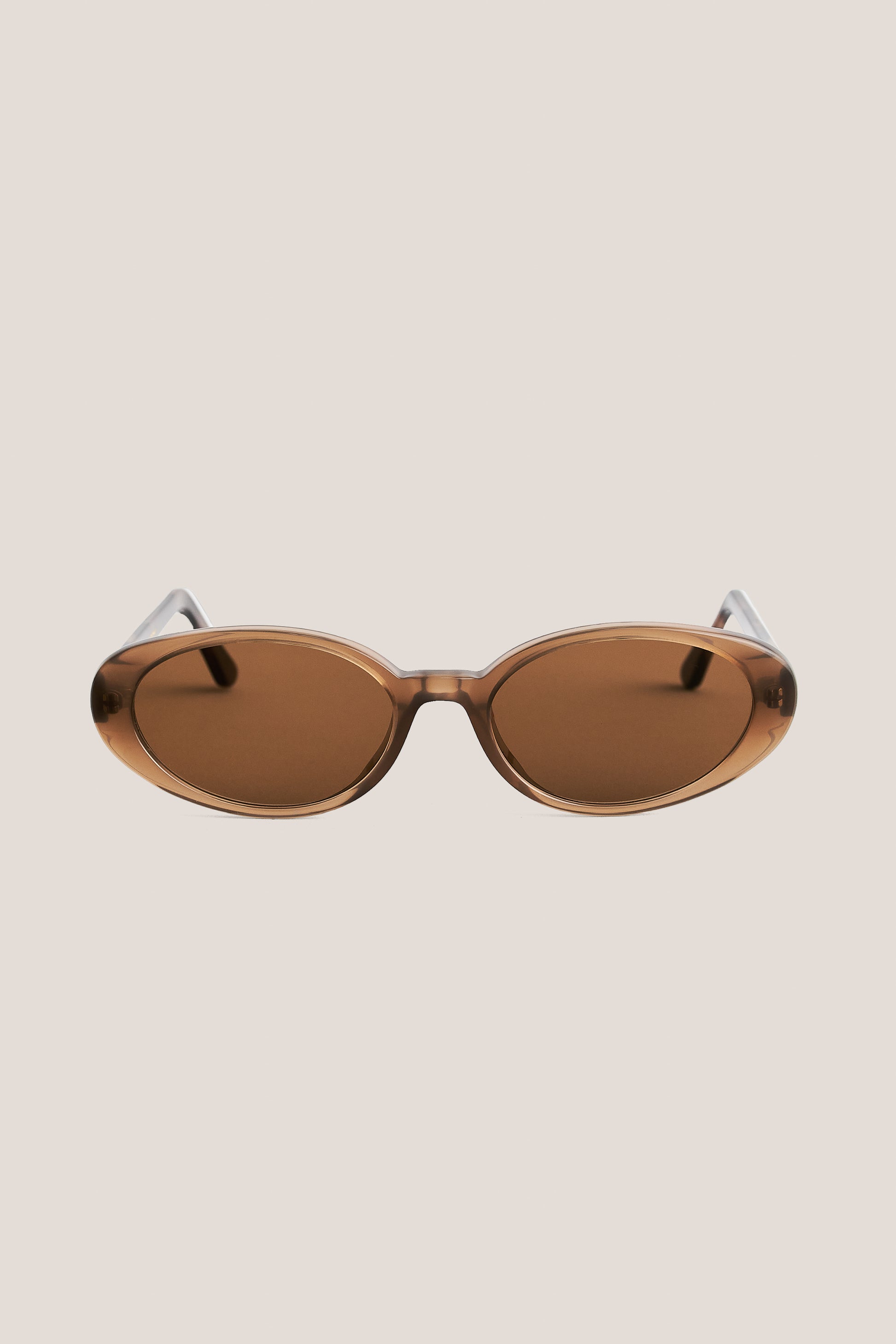Unisex accessories sunglasses, handcrafted oval acetate frame in solid black with dark grey Carl Zeiss® lenses.