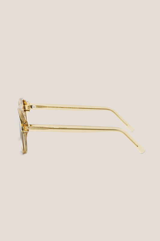 Unisex accessories sunglasses, handcrafted transparent acetate aviator-shaped frames with rounded vintage-inspired edges.