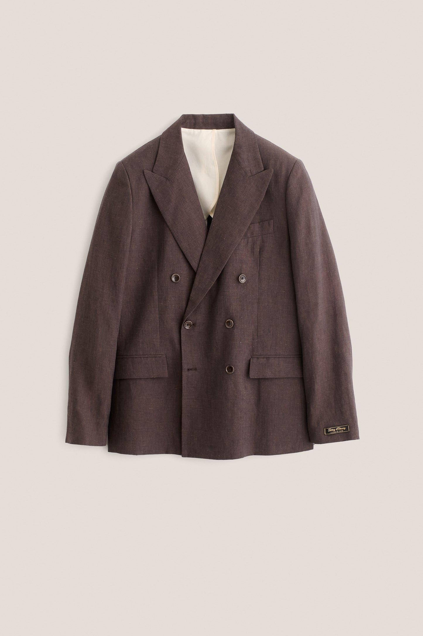 Men's tailoring, double-breasted peak blazer, 100% linen, brown, with wide lapels and frankfurter pockets.
