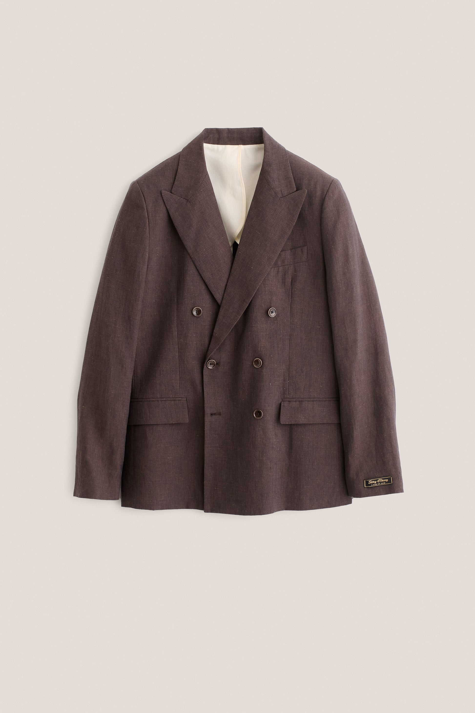 Men's tailoring, double-breasted peak blazer, 100% linen, brown, with wide lapels and frankfurter pockets.