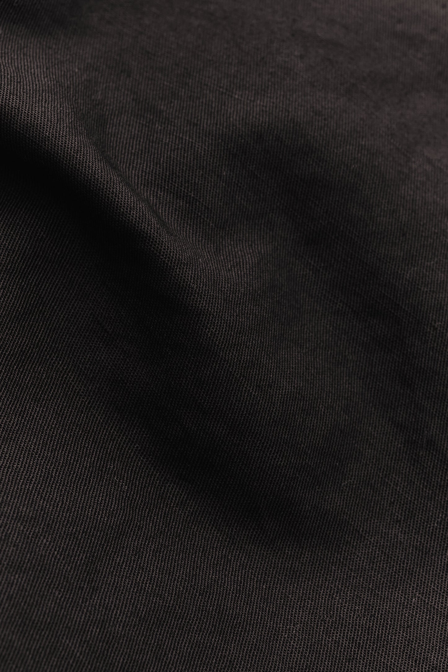 Men's long-pants, linen and cotton blend, garment-dyed deep black, structured weave.
