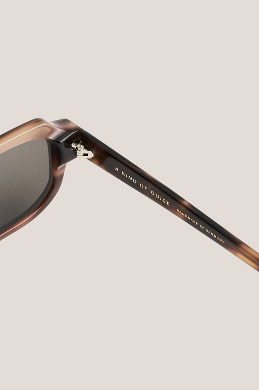 Unisex accessories sunglasses, acetate, tortoiseshell, rectangular frame with rounded edges and dark lenses.