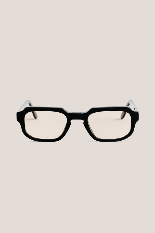 Unisex accessories sunglasses, black acetate, bold rectangular frame with rounded edges and sculptural outer corners.