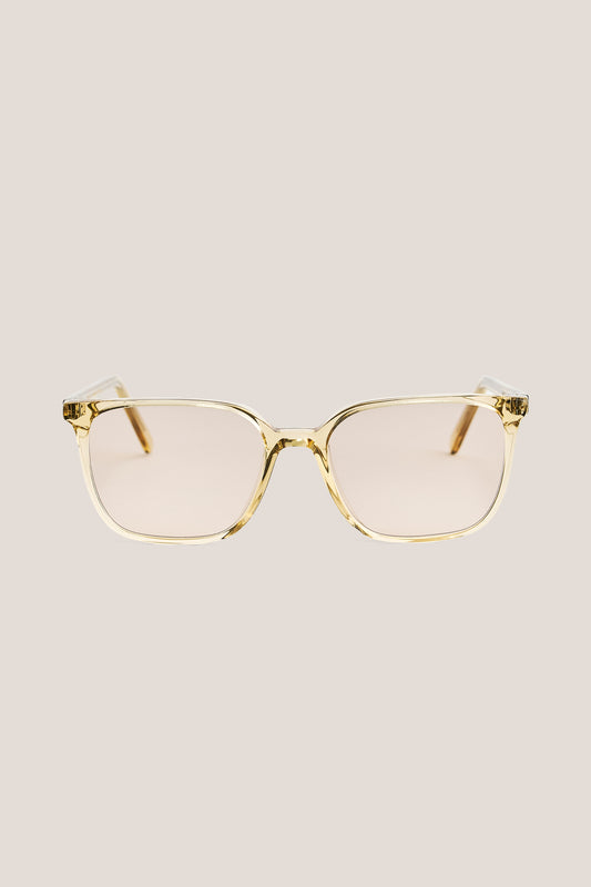 Unisex accessories sunglasses, 100% acetate, light brown frame with peach-tinted Carl Zeiss lenses.