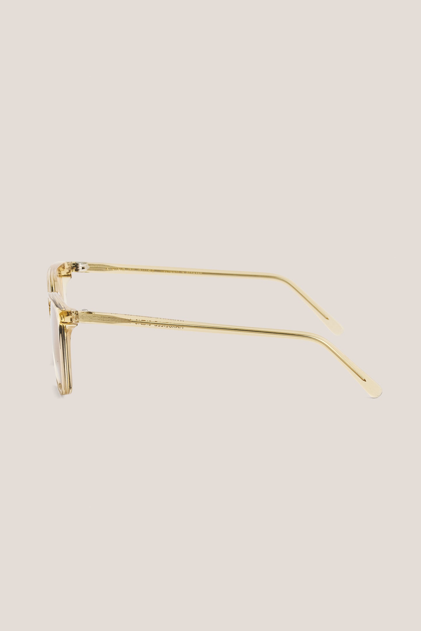 Unisex accessories sunglasses, transparent beige acetate frame with gold temples and Carl Zeiss lenses.