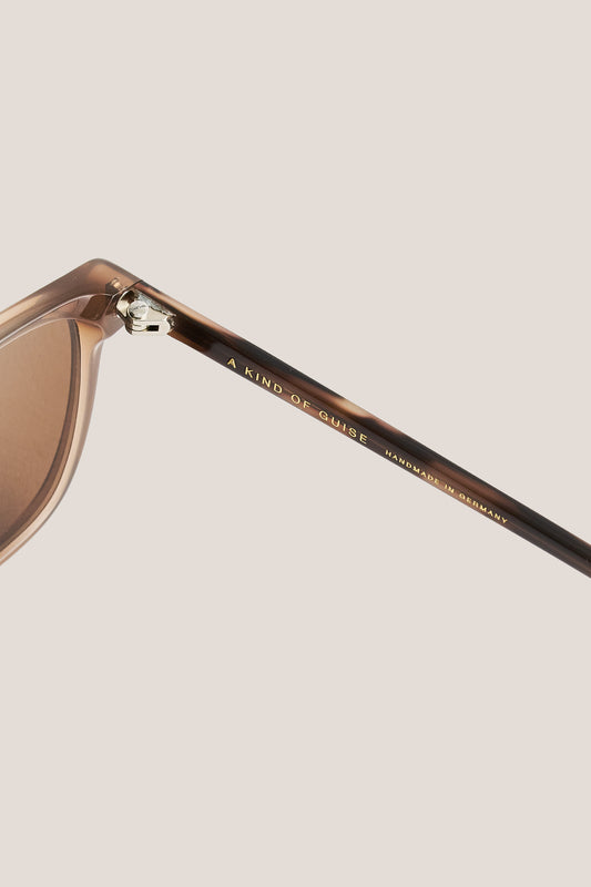 Unisex accessories sunglasses, brown acetate frame, Carl Zeiss® lenses, "A KIND OF GUISE" logo.