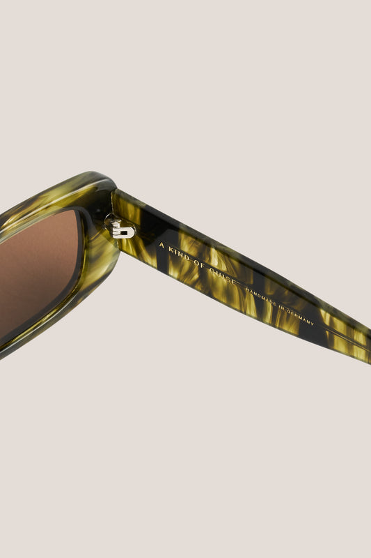 Unisex accessories sunglasses, wide and narrow green marbled acetate frame with brown Carl Zeiss lenses.