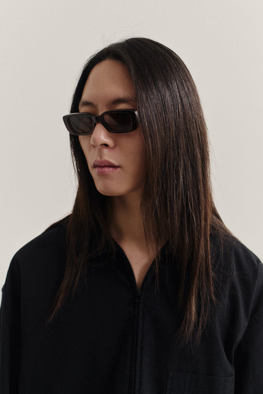 Women's accessories sunglasses, black acetate, wide and narrow frame, Carl Zeiss lenses.