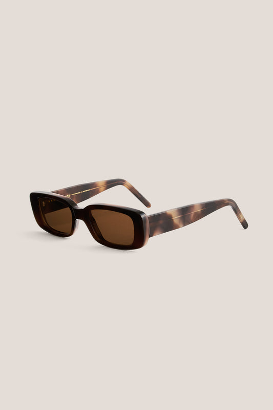 Women's accessories, Odessa sunglasses, rectangular tortoise acetate frame, brown lenses.