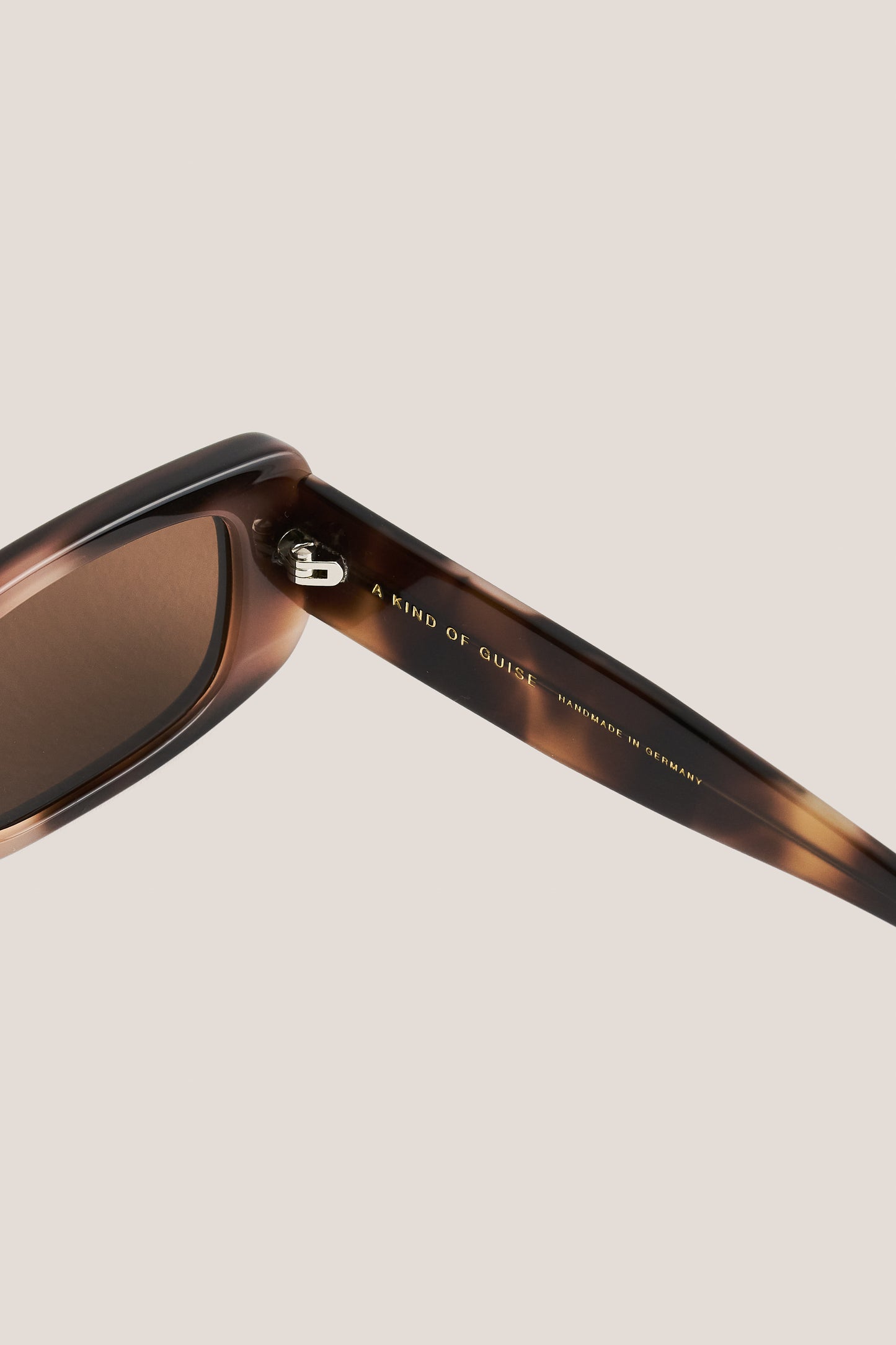 Unisex accessories sunglasses, acetate, tortoiseshell, with "A KIND OF GUISE" and "HANDMADE IN GERMANY" on the temple.