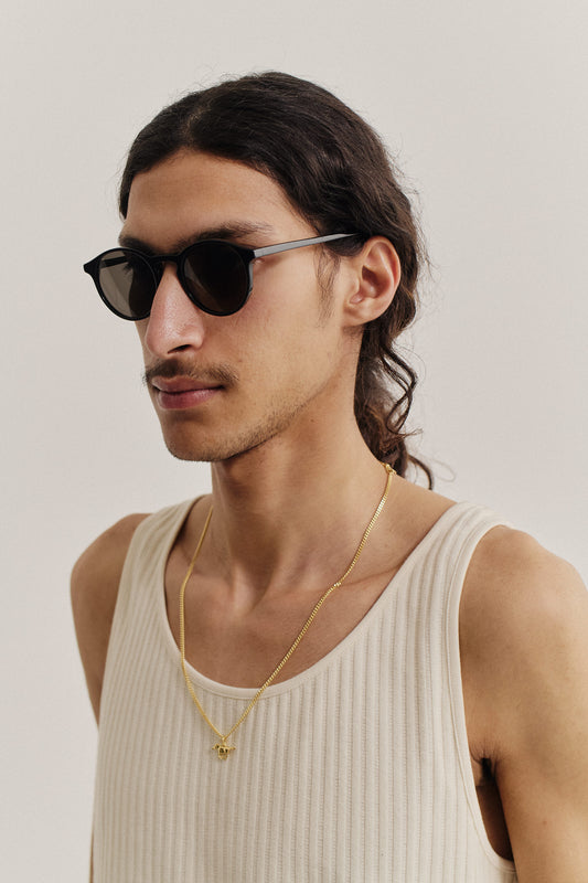 Men's accessories sunglasses, black acetate, thick square frames, Carl Zeiss lenses.
