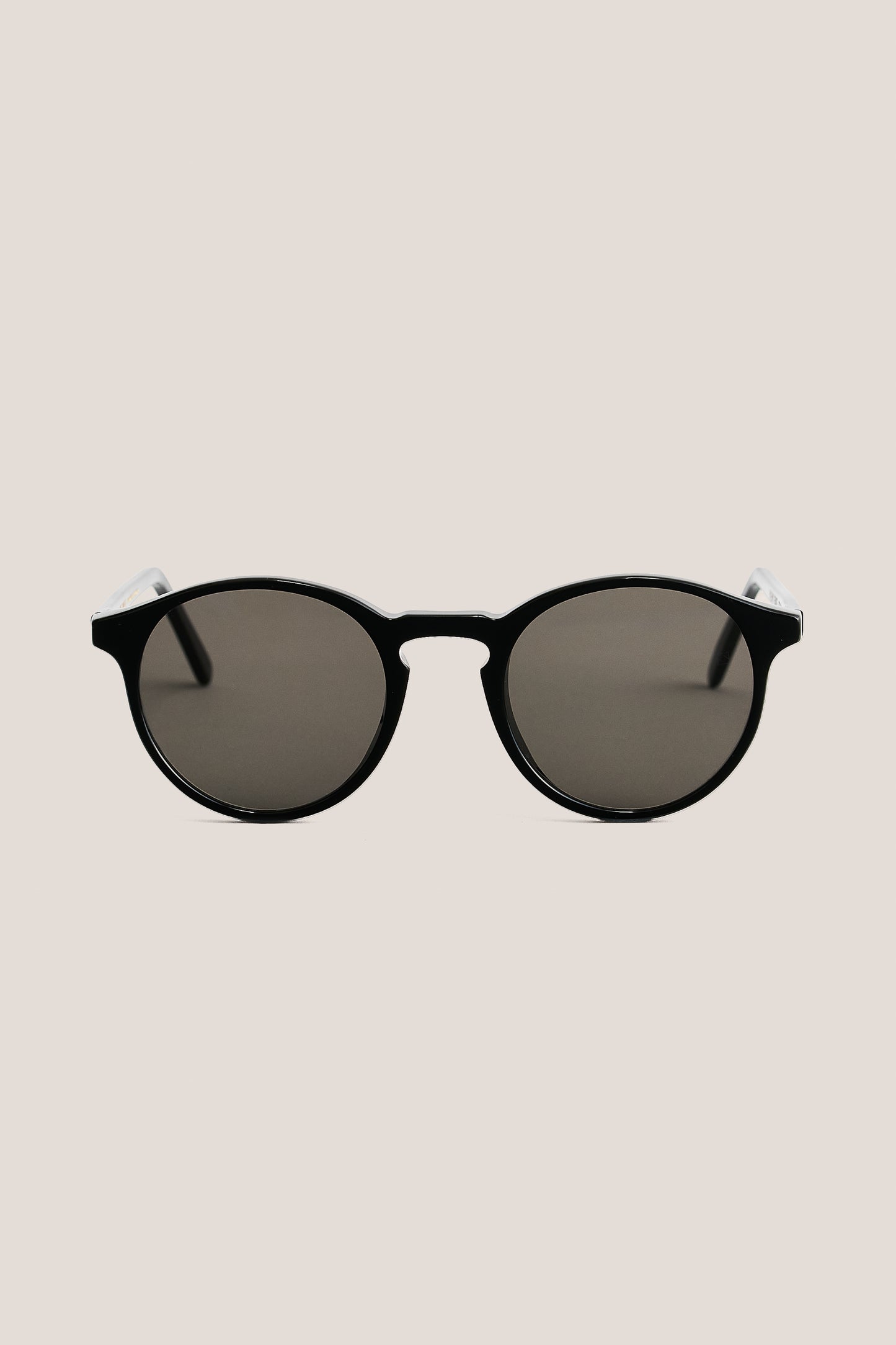 Unisex accessories sunglasses, black acetate frames with dark Carl Zeiss lenses.