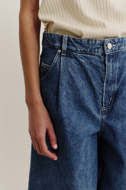 Women's shorts, cotton mix denim, stone washed, blue, wide fit pleated bermuda shorts.