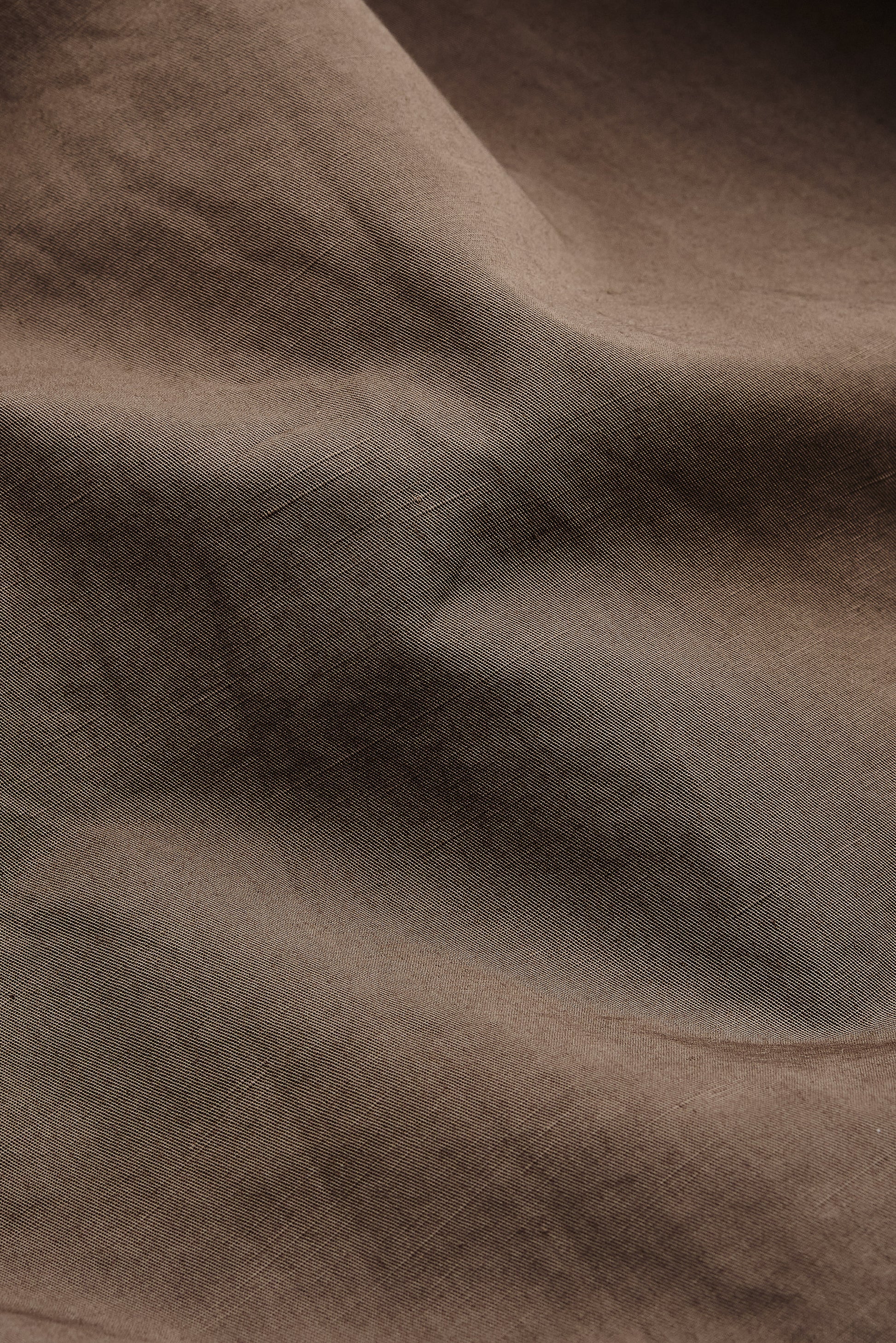 Men's shorts, cotton-linen blend, garment-dyed brown, with a relaxed fit and natural texture.