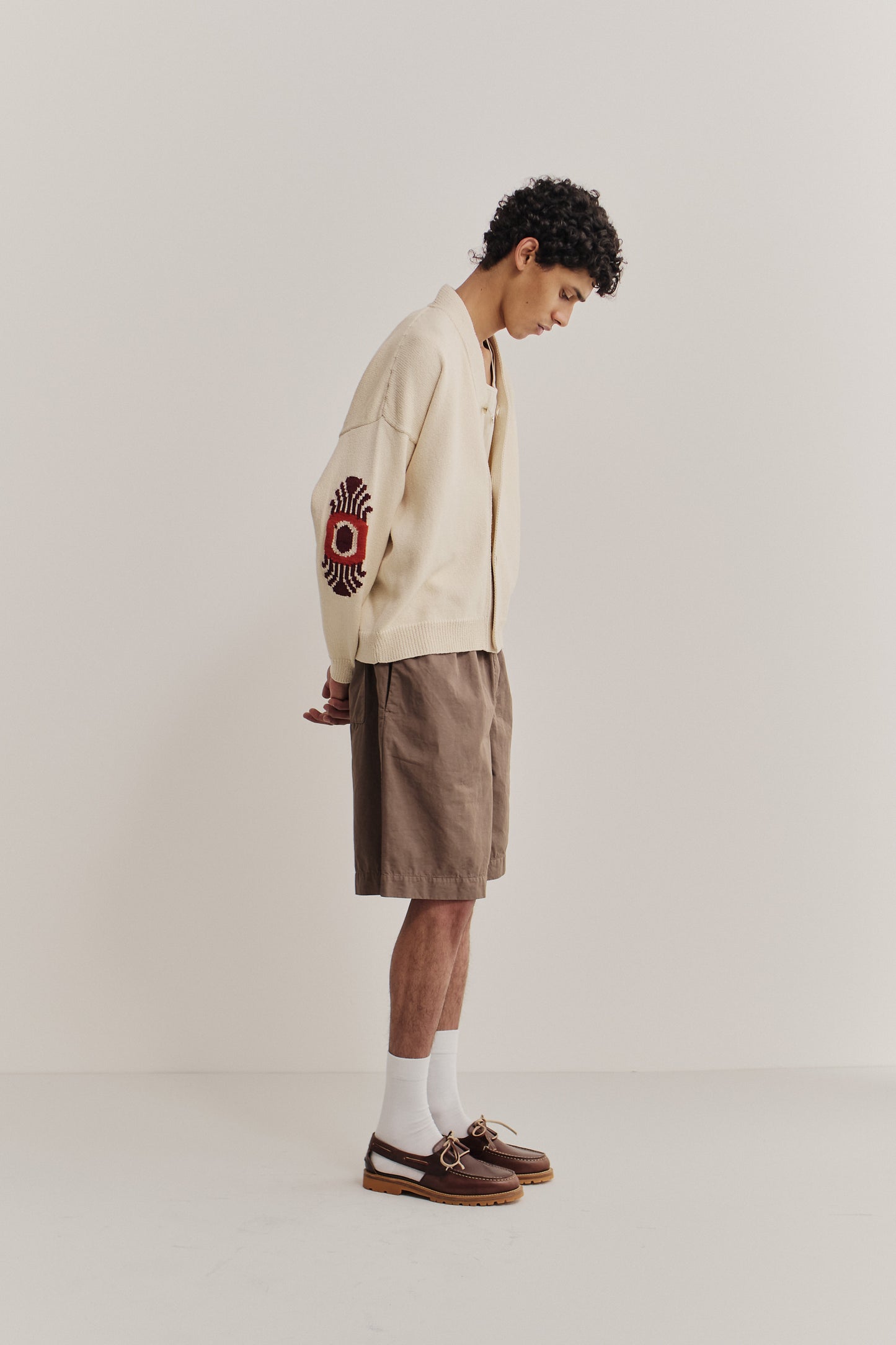 Men's shorts, cotton-linen blend, garment-dyed brown, relaxed fit with side pockets.