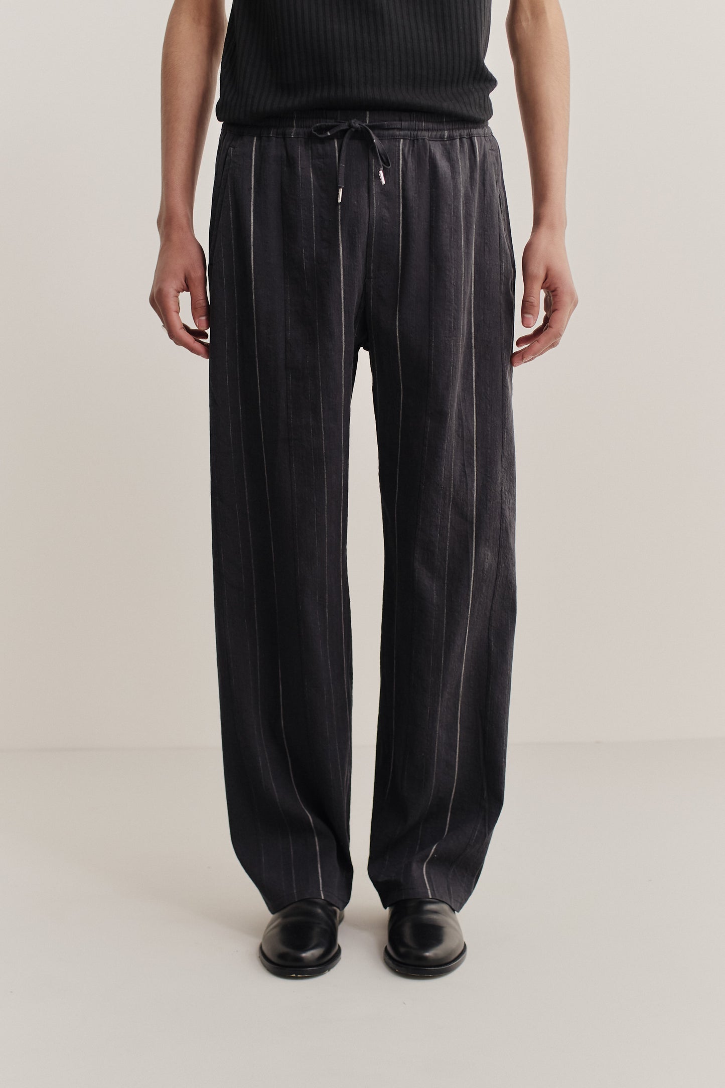 Men's long pants, cotton-linen blend, black with white stripes, wide straight fit, elasticated waist.