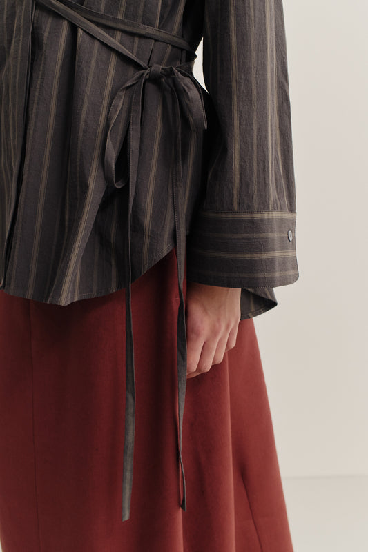 Women's long-sleeved shirt, 100% organic cotton, yarn-dyed dark grey with beige/brown stripes, wrap-around tie waist.