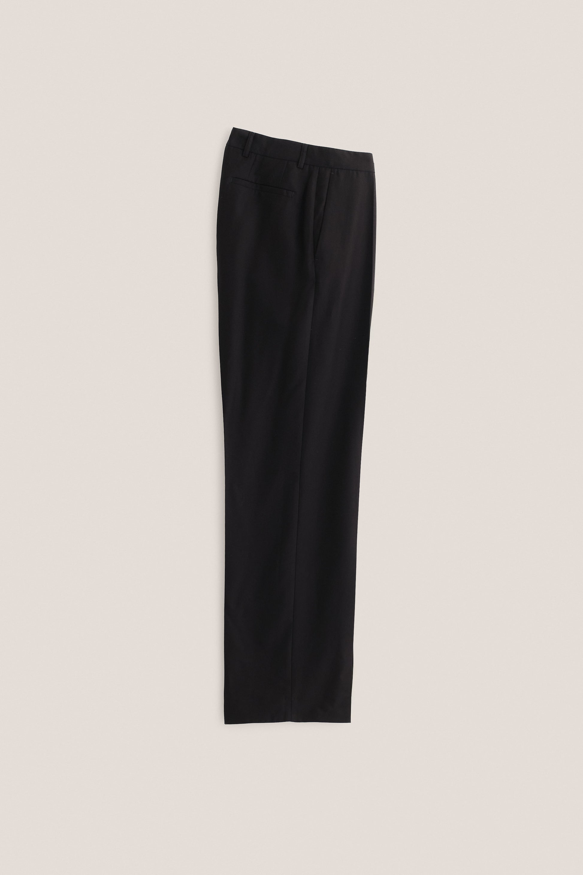 Men's long-pants, lyocell heavy twill, deep black, straight wide-leg cut, hidden front closure, pressed pleat.