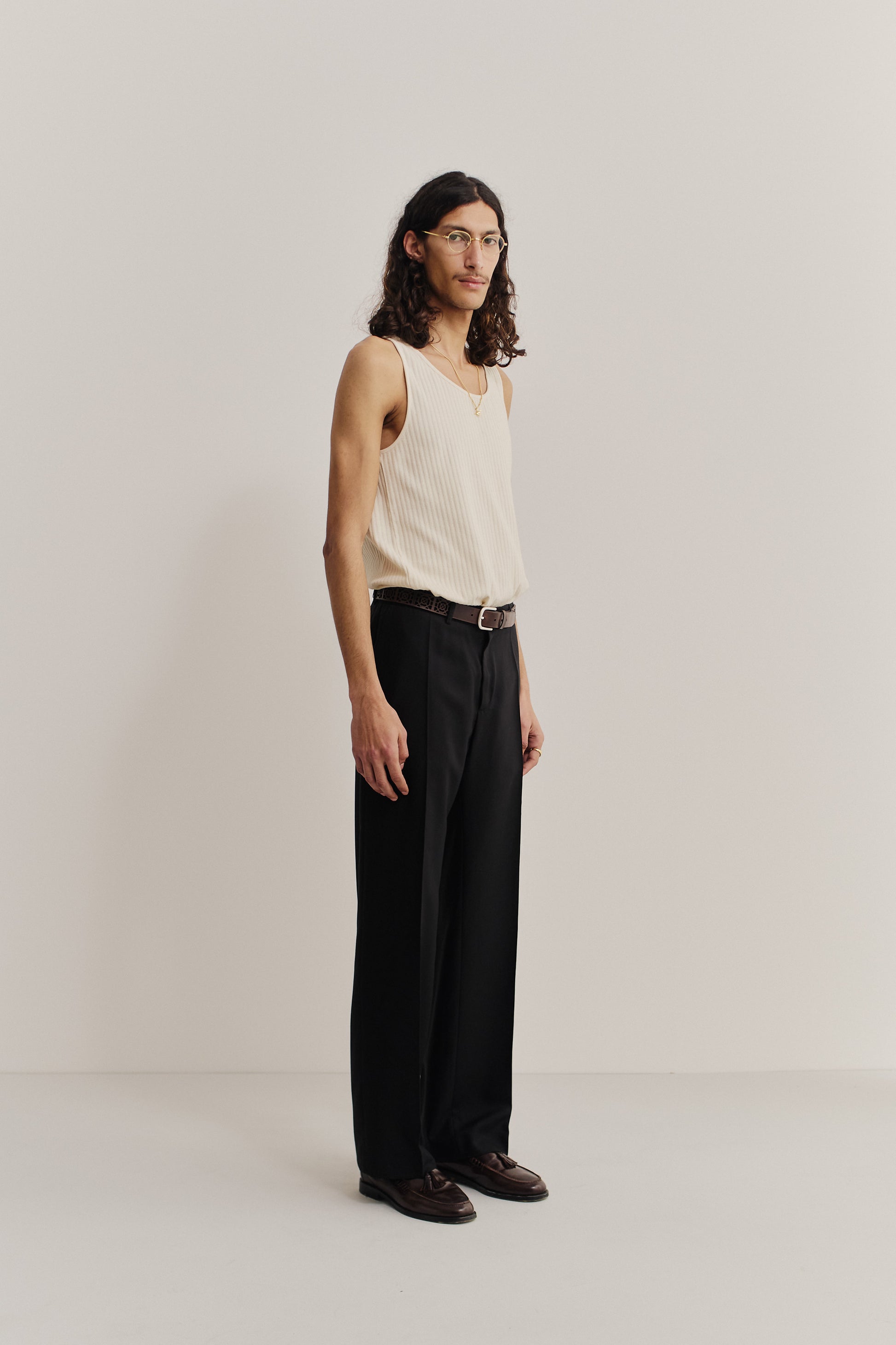 Men's long-pants, lyocell twill, black, wide-leg cut with pressed front pleat.