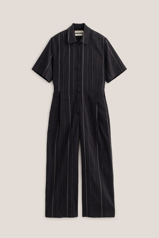 Women's jumpsuit, short-sleeved, black cotton-linen blend with white stripes, lay-down collar, wide leg.