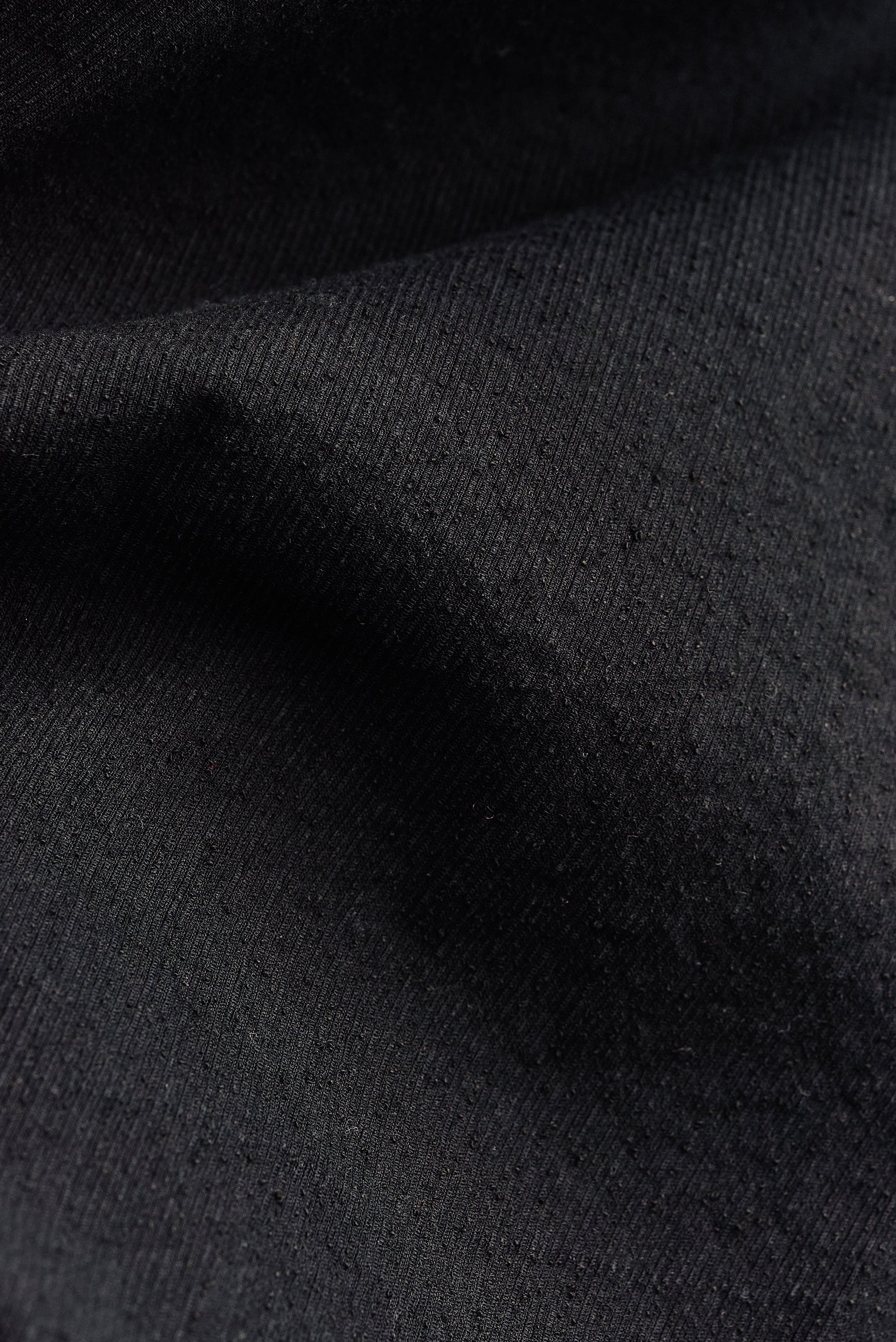 Men's shorts, black cotton blend fabric with irregular wavy stripes, pre-washed for softness.