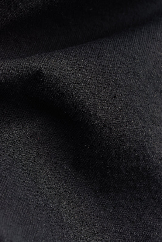 Men's shorts, black cotton blend fabric with irregular wavy stripes, pre-washed for softness.